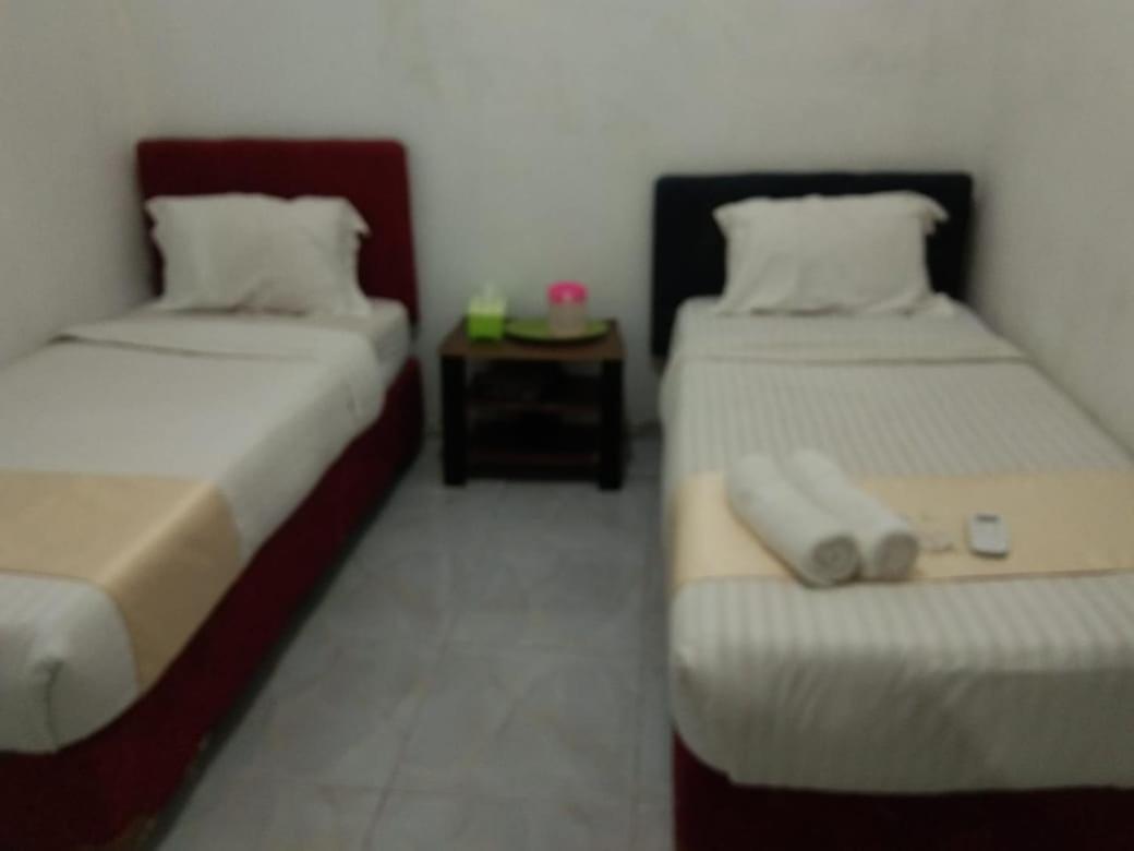 Hotel Krui Syariah Экстерьер фото