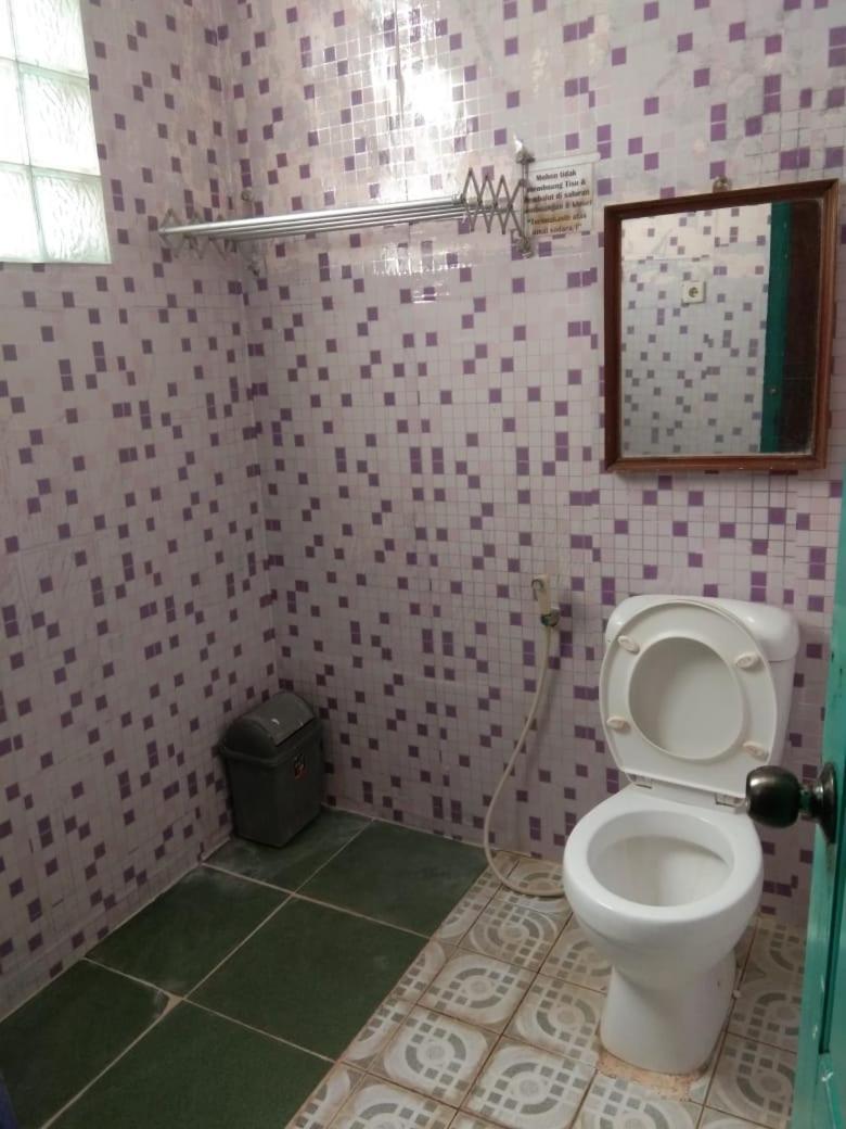 Hotel Krui Syariah Экстерьер фото