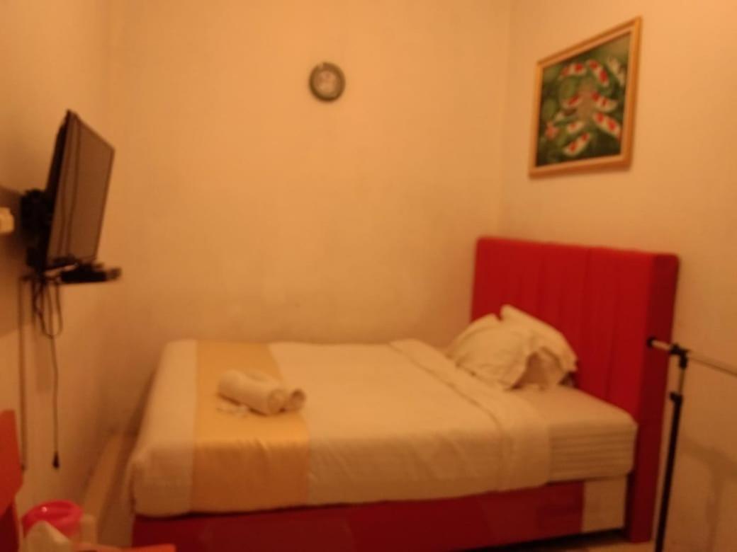 Hotel Krui Syariah Экстерьер фото
