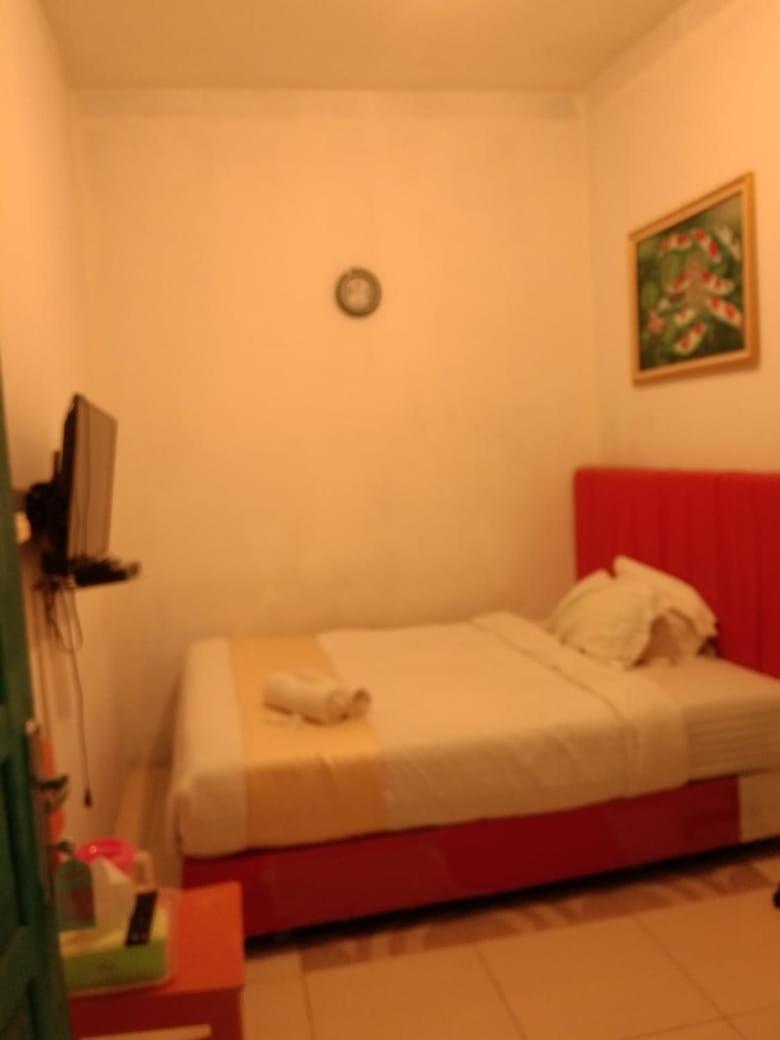Hotel Krui Syariah Экстерьер фото